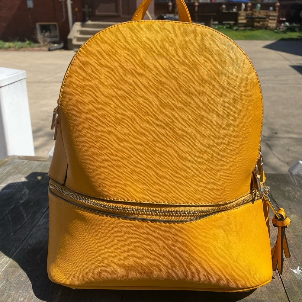Mustard yellow mini *backpack* purse